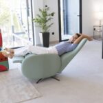 Blue swivel chair reclined